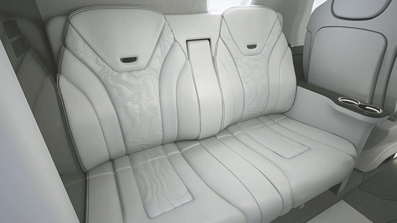 View of the side-facing couch in the Citation Ascend.